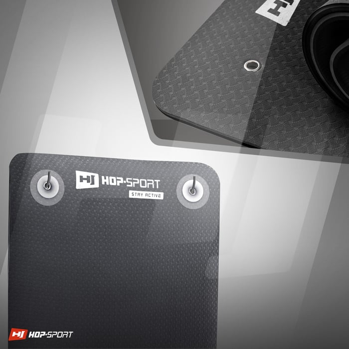 Fori pratici che consentono di appendere il tappetino TPE di colore nero-rosso del marchio Hop-sport