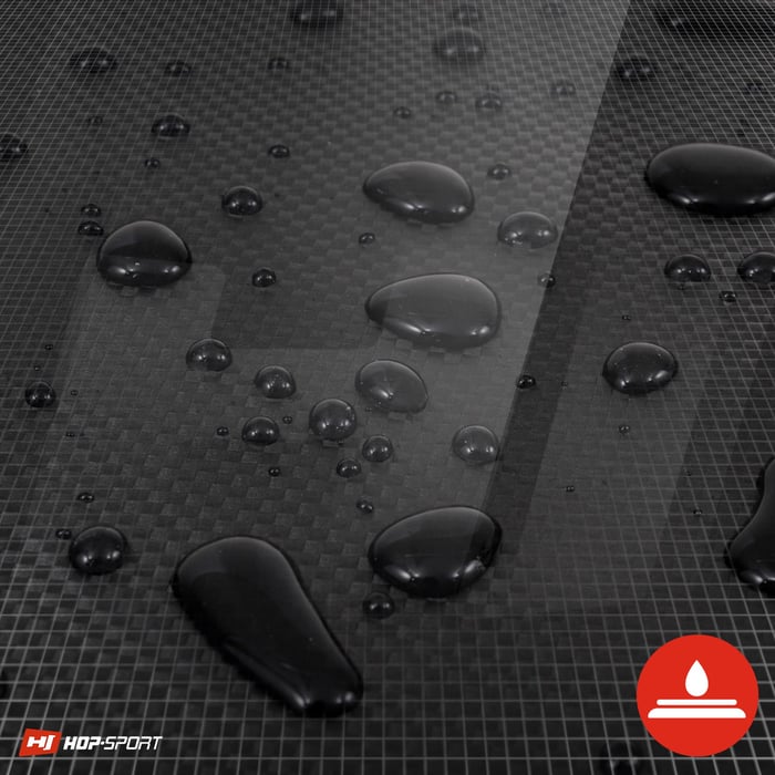 Primo piano sul rivestimento impermeabile del materasso ginnico Hop-Sport di colore nero