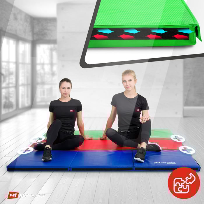 Primo piano dei velcri che permettono di collegare il materasso ginnico verde con modelli simili del produttore Hop-Sport