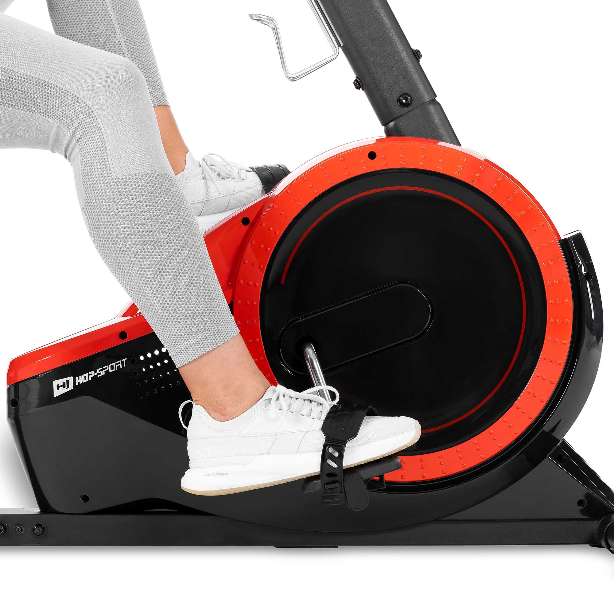 Cyclette orizzontale magnetica HS-060L Pulse rossa dotata di pedali antiscivolo con cinghie di blocco