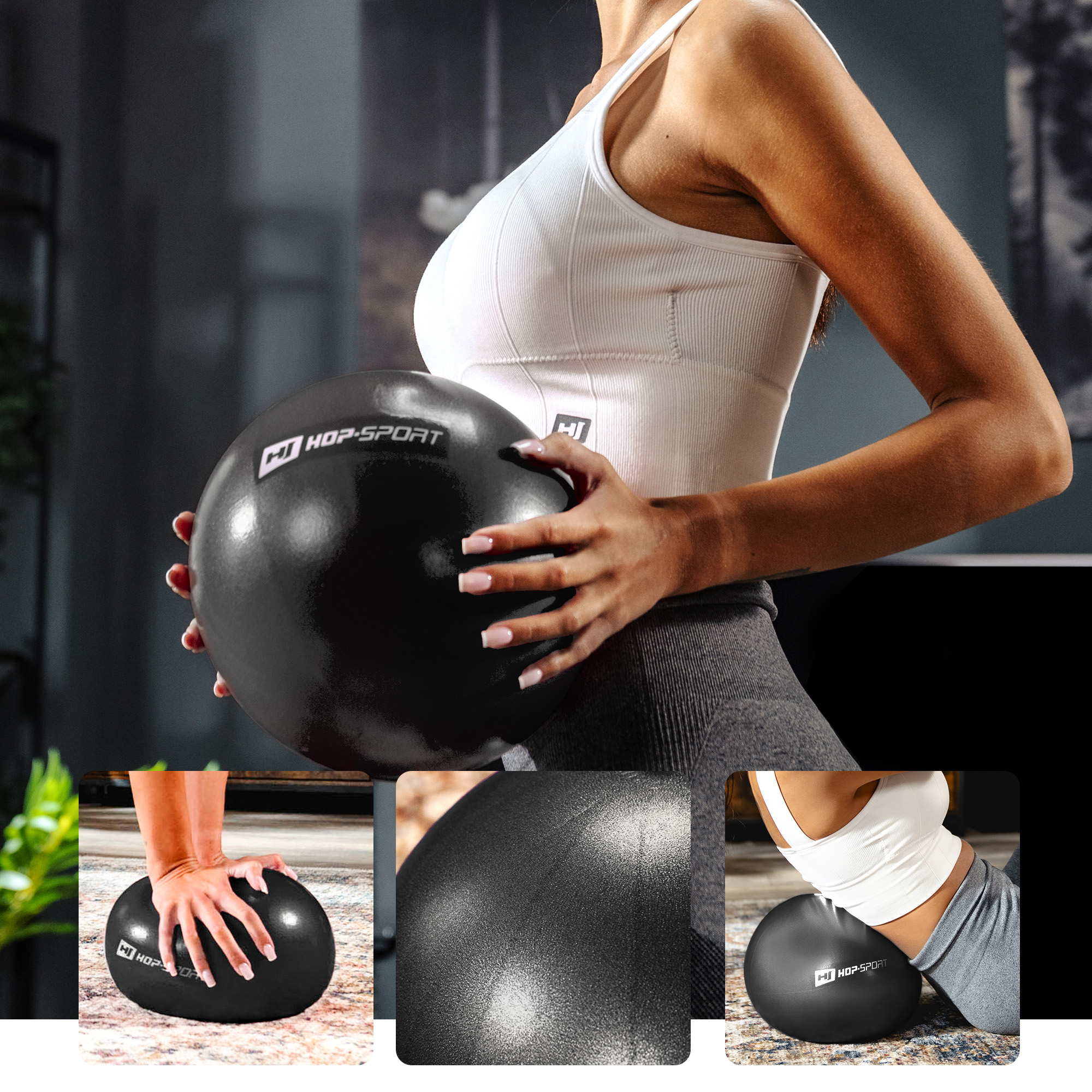 Modella che si allena con palla nera da pilates Hop-Sport