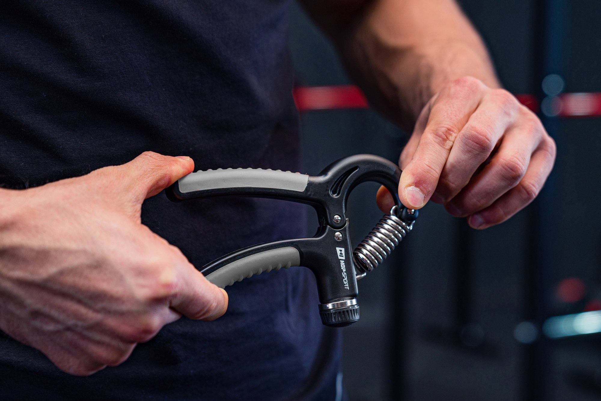 Molla che regola la resistenza nell'impugnatura nero-grigio 5-60kg