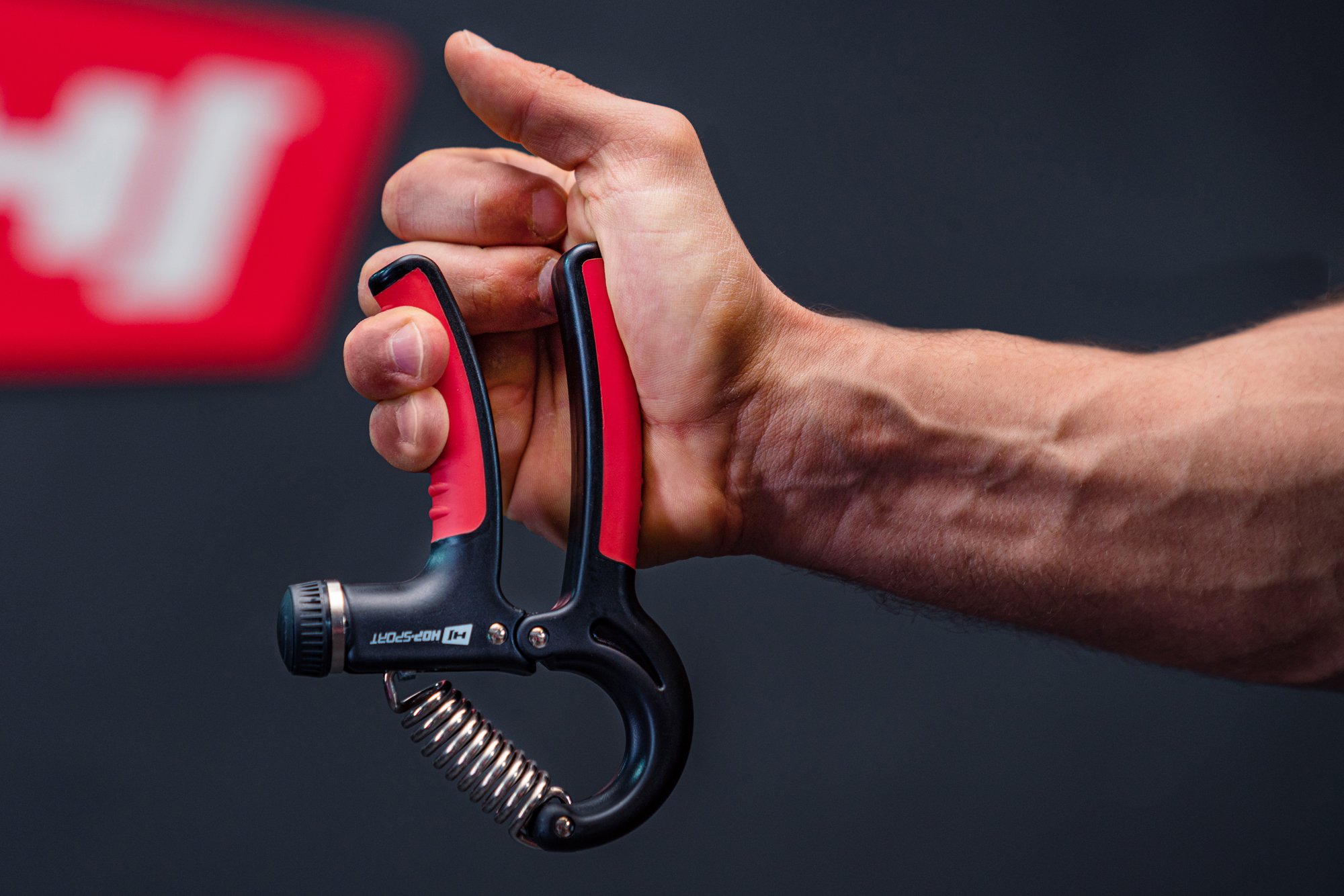 Maniglie antiscivolo nell'impugnatura regolabile 5-60kg in colore nero-rosso